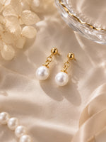 Gold-tone pearl drop earrings included in the Camellia Mist Blue Gift Set